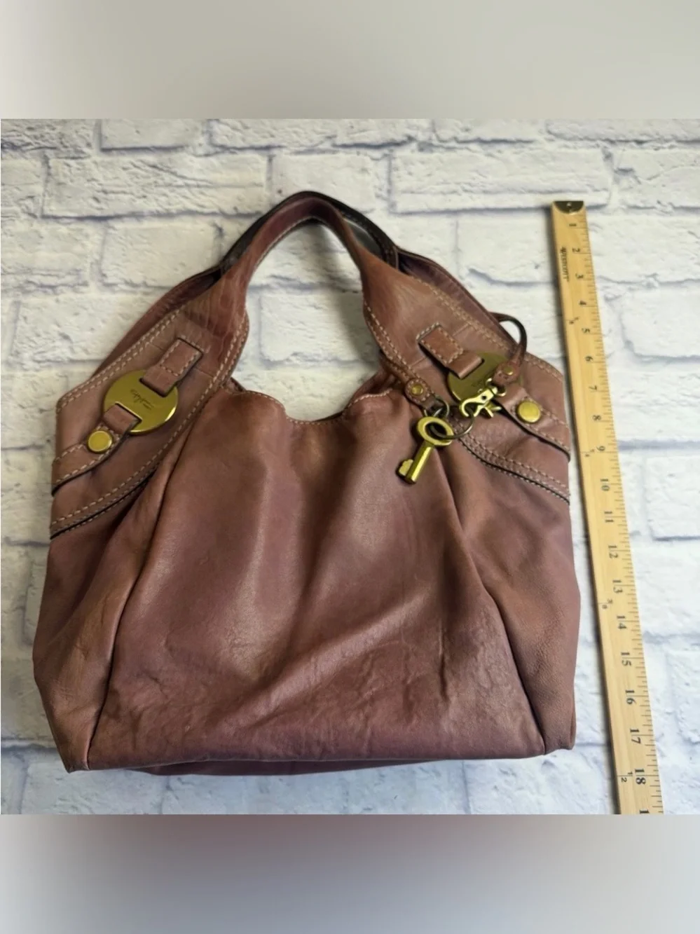 Vintage Fossil Fifty-Four “Blake”Mauve Leather Hobo Bag with Brass Key Charm
